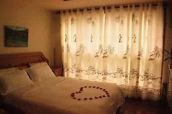 Yangguang Xingzuo Apartment Hotel Chongqing Extérieur photo