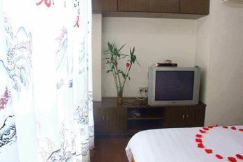 Yangguang Xingzuo Apartment Hotel Chongqing Extérieur photo