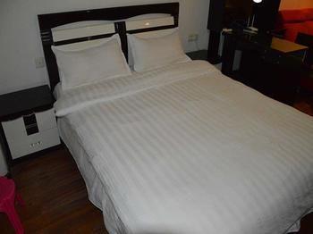 Yangguang Xingzuo Apartment Hotel Chongqing Extérieur photo